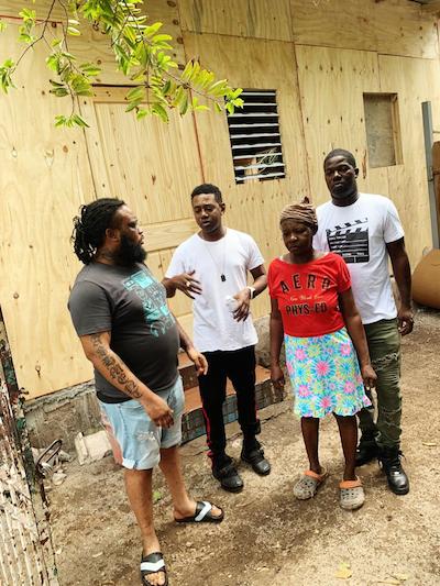 Rags 2 Riches label builds house for middle-aged woman in Grants Pen